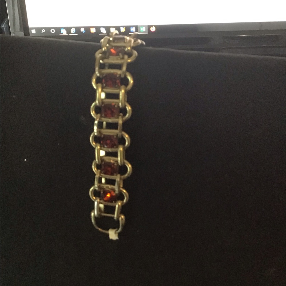 Leather and metal. Topaz stones bracelet